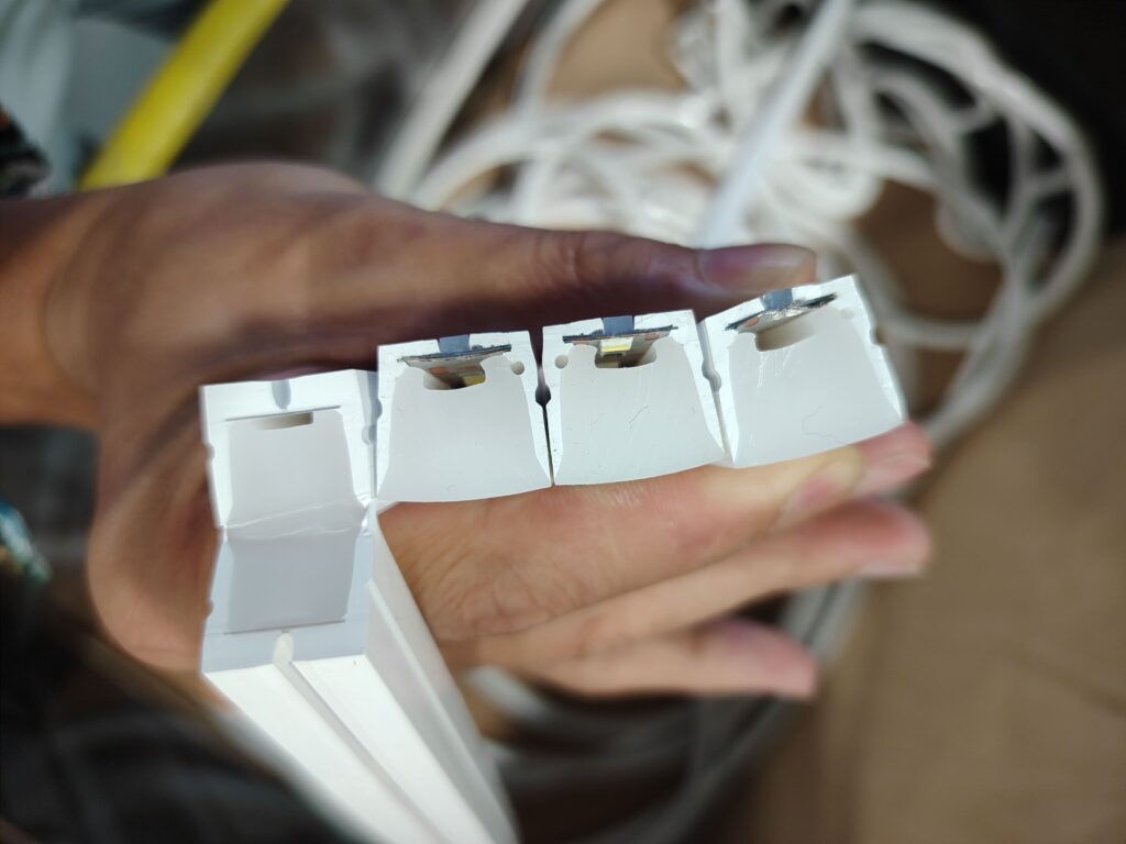 Cross-sectional shape detection and comparison at different positions along a silicone LED light strip.