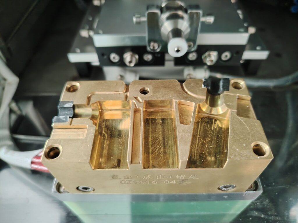 An LSR injection mold for LED strip end caps with configurations for straight, side-exit, and sealed-end outputs.