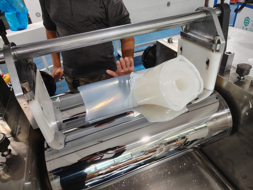 A 10-kilogram batch of silicone rubber compound being processed in a refining machine.