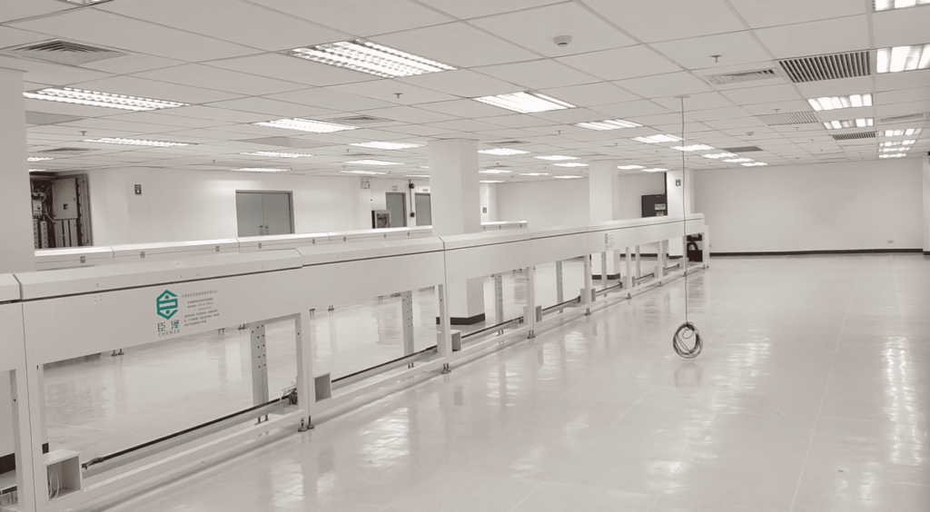 A bright, clean, and organized workshop with a fully installed silicone rubber LED strip extrusion line.