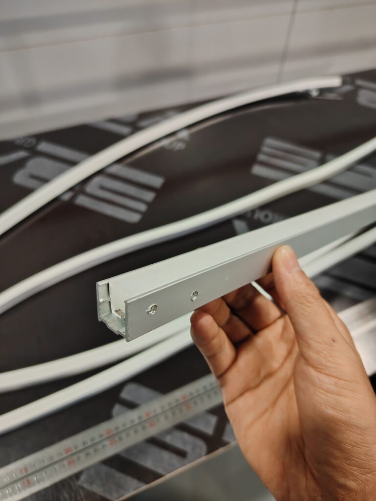 A finished silicone rubber LED strip securely installed and fixed within an aluminum mounting profile.