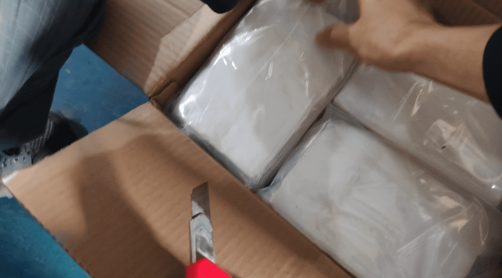 Sealed packaging of diffuser agent (e.g., titanium dioxide) for silicone rubber compounding.