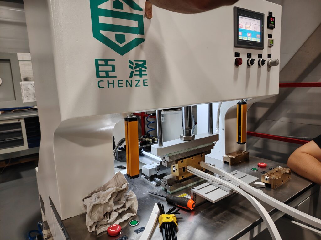 Liquid silicone rubber injection molding machine in the process of molding (pressing) an end cap.