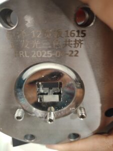 A 45-degree top-down view of the lower discharge channel in an extrusion inner mold