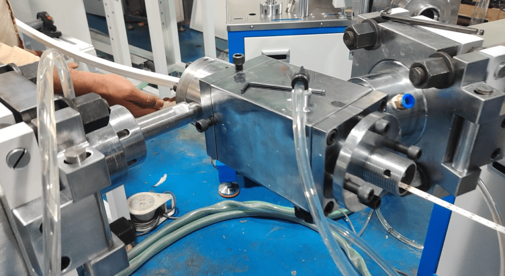 LED strip PCB being overmolded or encapsulated with silicone rubber in extrusion process.