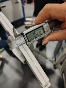 Using a digital caliper to perform precise dimensional inspection on a silicone LED strip