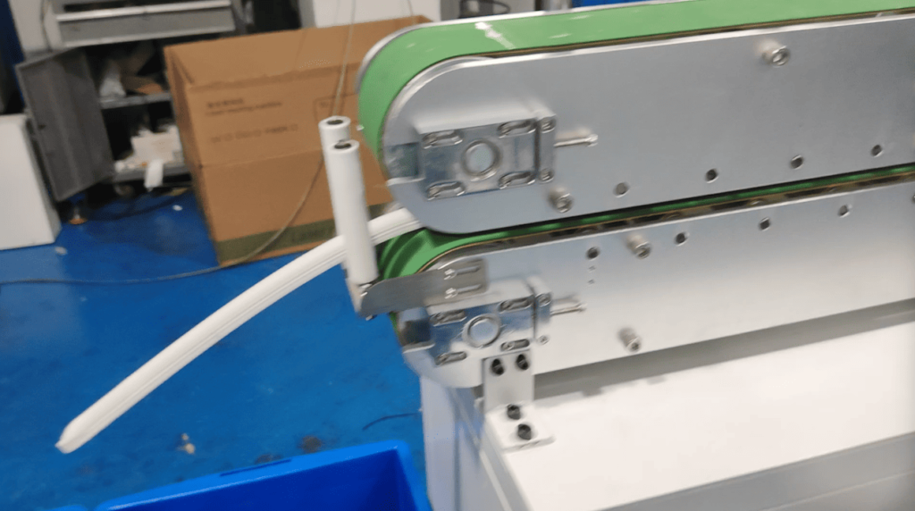 Steady-state operation of the caterpillar tracking (puller) machine gripping and moving the cured silicone strip.