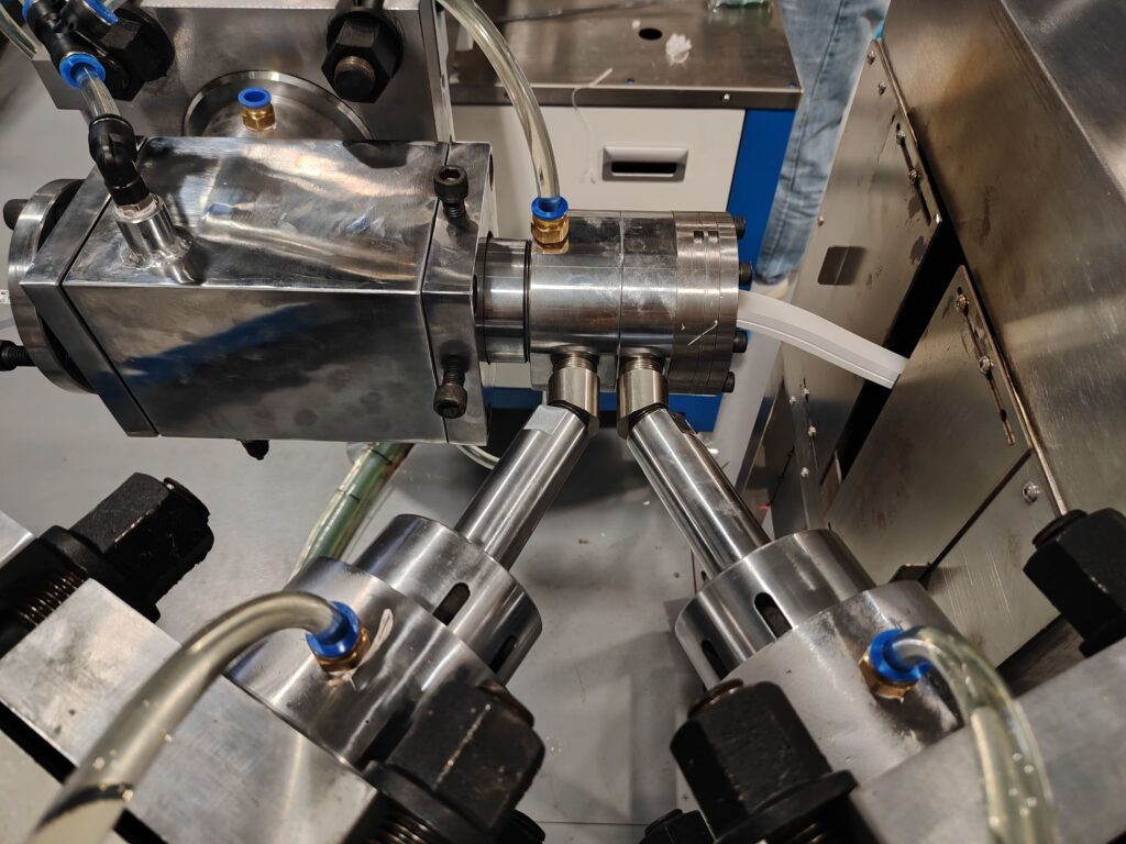 A custom 16mm x 15mm silicone LED strip entering the high-temperature curing oven on the conveyor