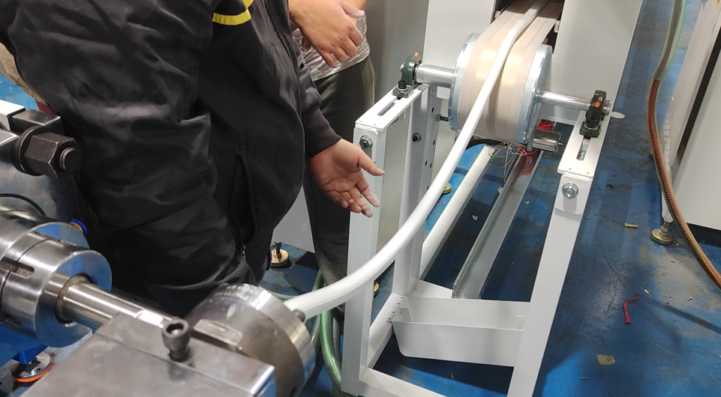 a bend strip come out from extruder and conveyor belt is slow