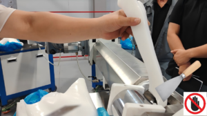 a picture shows the silicon material feeding with hard tools in the hopper is forbidden